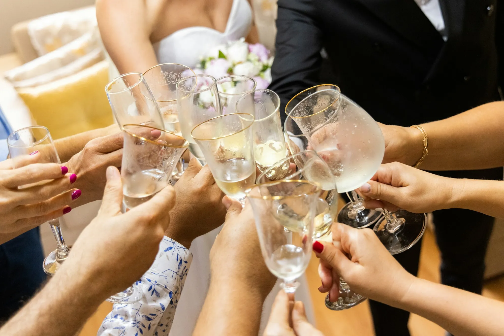 Group of friends raising glasses in a toast